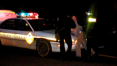 cops throwing a man ...