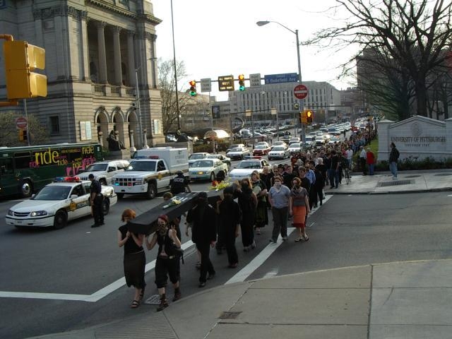 Black-clad thugs wit...