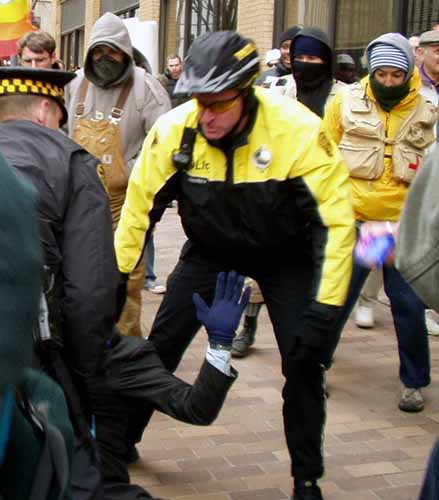 Protester taken back...