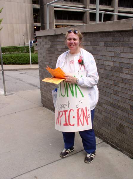 Giving out pamphlets...