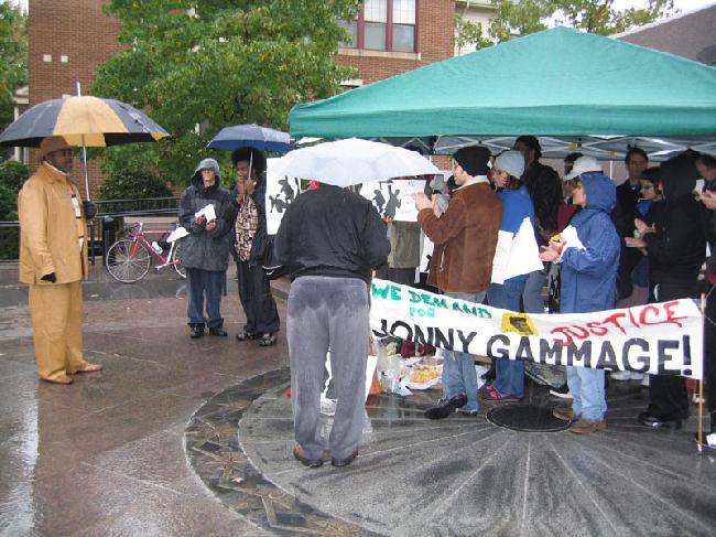 huddled under a tent...