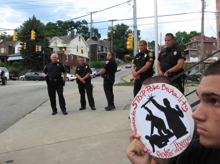 cops watch the crowd...
