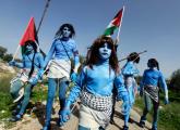 Palestinians dressed as the Na'vi from the film Avatar stage a protest Israeli Wall